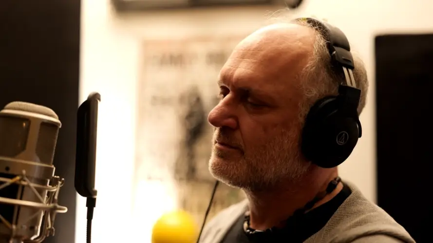 Carlos Ibex with Microphone
